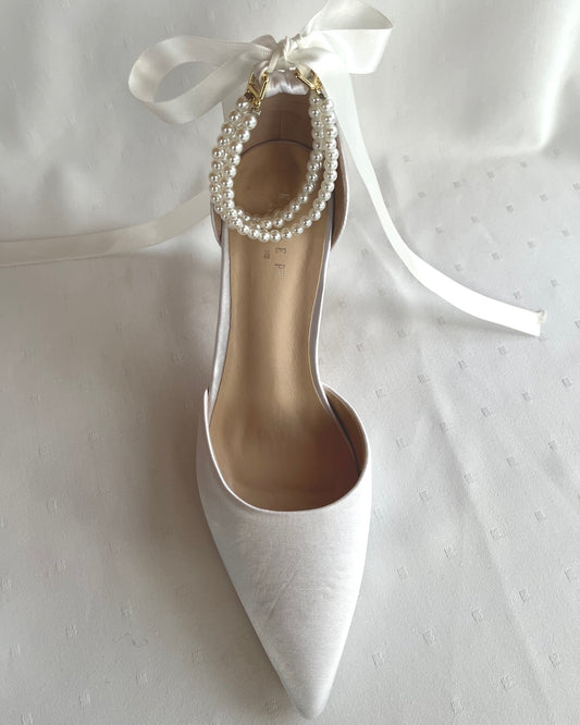 Helminilkkaremmi kolme riviä